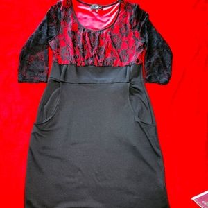 Black and red lace stretch dress with pockets.